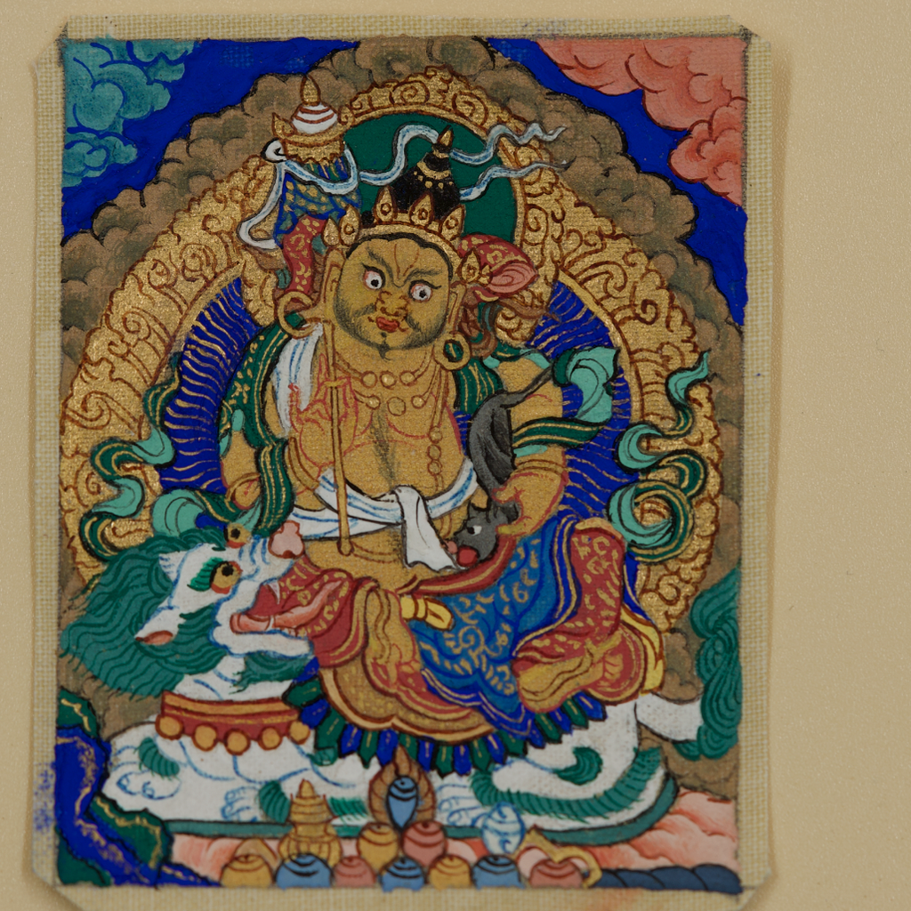 Vaiśravaṇa on Dragon Thangka Pendant · Object 207