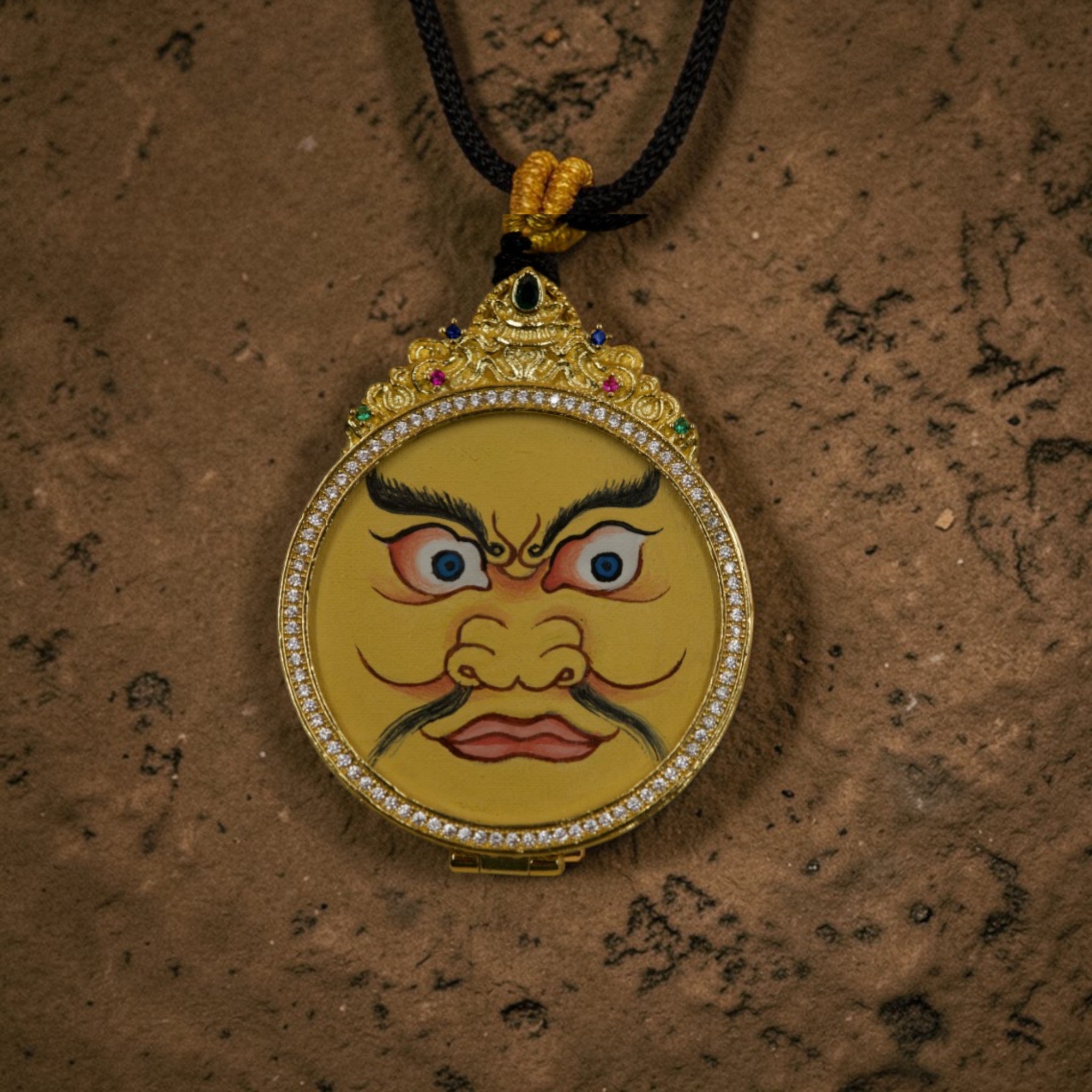 Yellow Jambhala Face Circular Thangka Pendant · Object 209