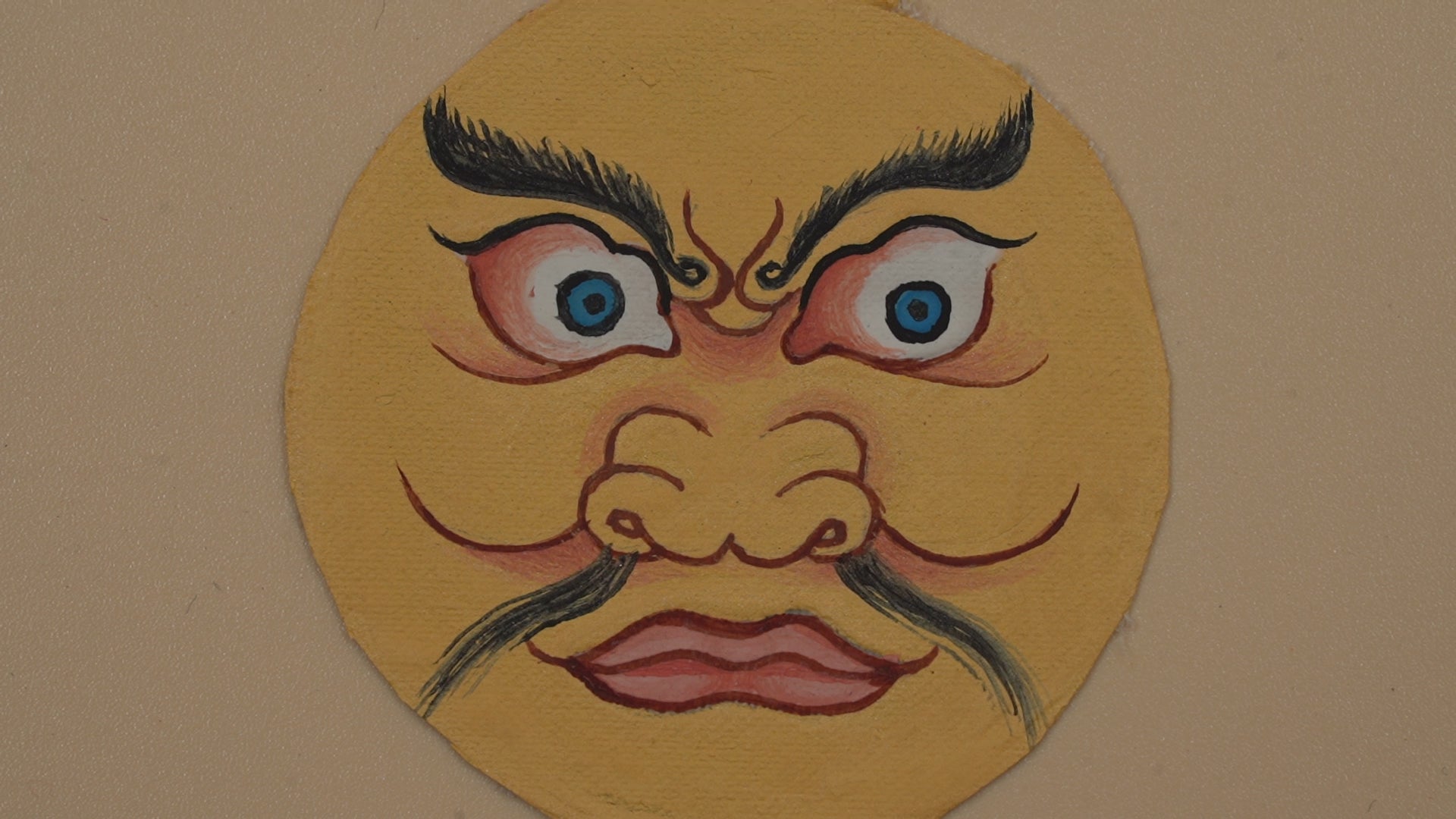 Yellow Jambhala Face Circular Thangka Pendant · Object 209
